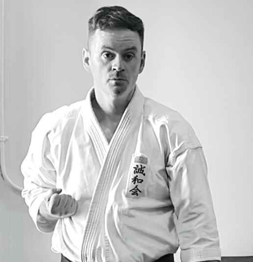 Senpai Matt Costello, 5th Dan Black Belt, traditional kata form and technical karate instructor.